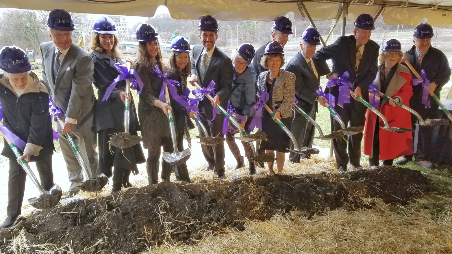 Cincinnati Ballet and local officials and donors toss the first shovels of dirt on the ballet's new dance center.